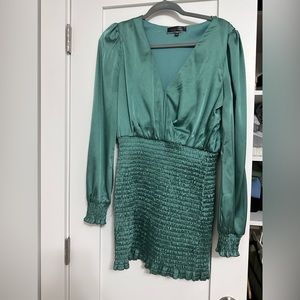 Silk dress, sits beautifully on the body , and is so stylish!